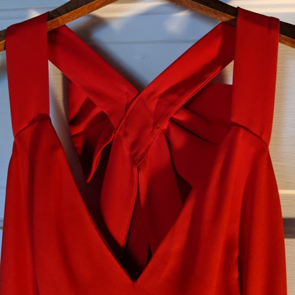 Open Back Bow dress with black mini skirt. - Picture 3 of 8